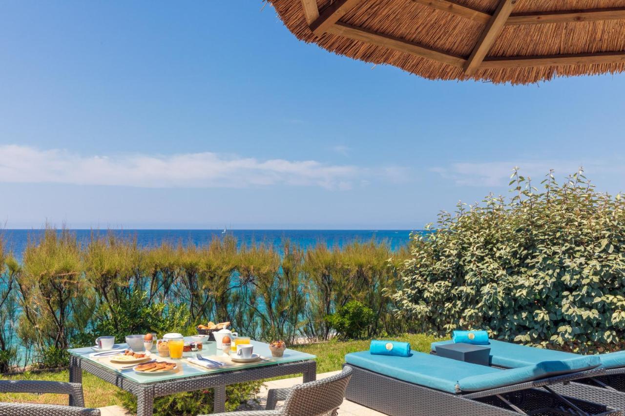 Hotel Le Ruesco Ольмето Екстер'єр фото