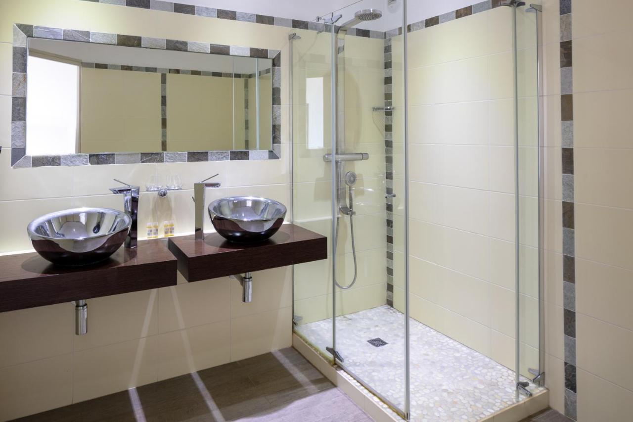 Hotel Le Ruesco Ольмето Екстер'єр фото