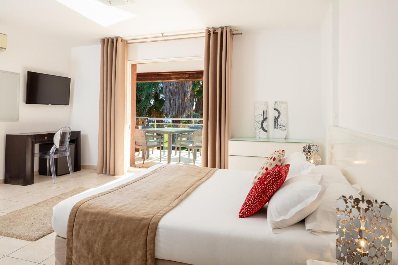 Hotel Le Ruesco Ольмето Екстер'єр фото